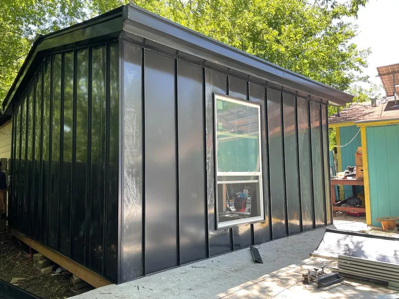 Black standing seam metal wall panels for Roof Inspection in Des Plaines