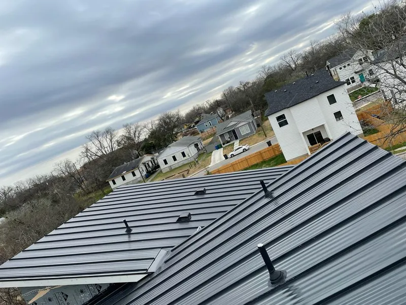 Standing seam metal roof panels with vents for Skylight Repair in Des Plaines